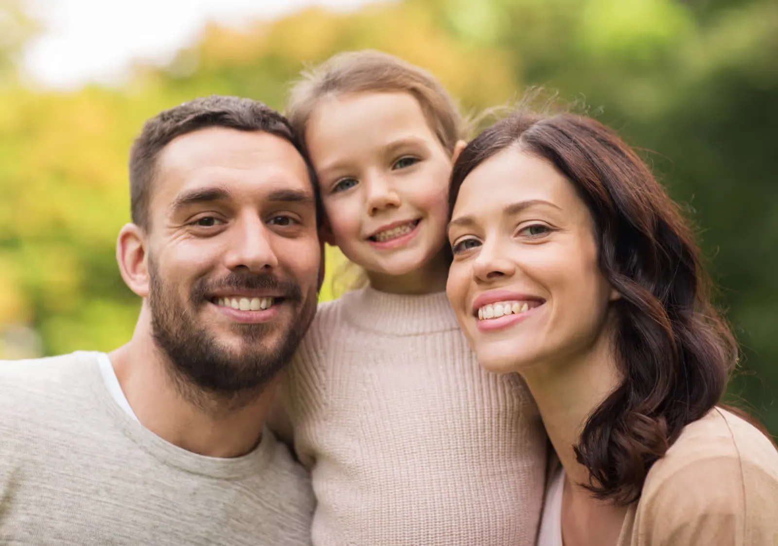 Happy family in a summer park