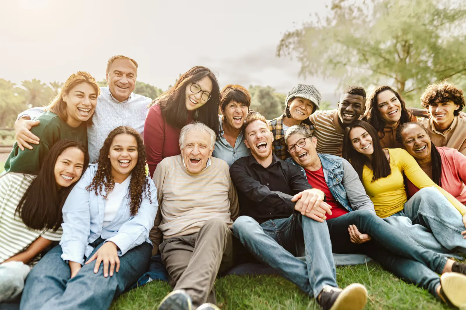 Happy multigenerational family smiling together outdoors