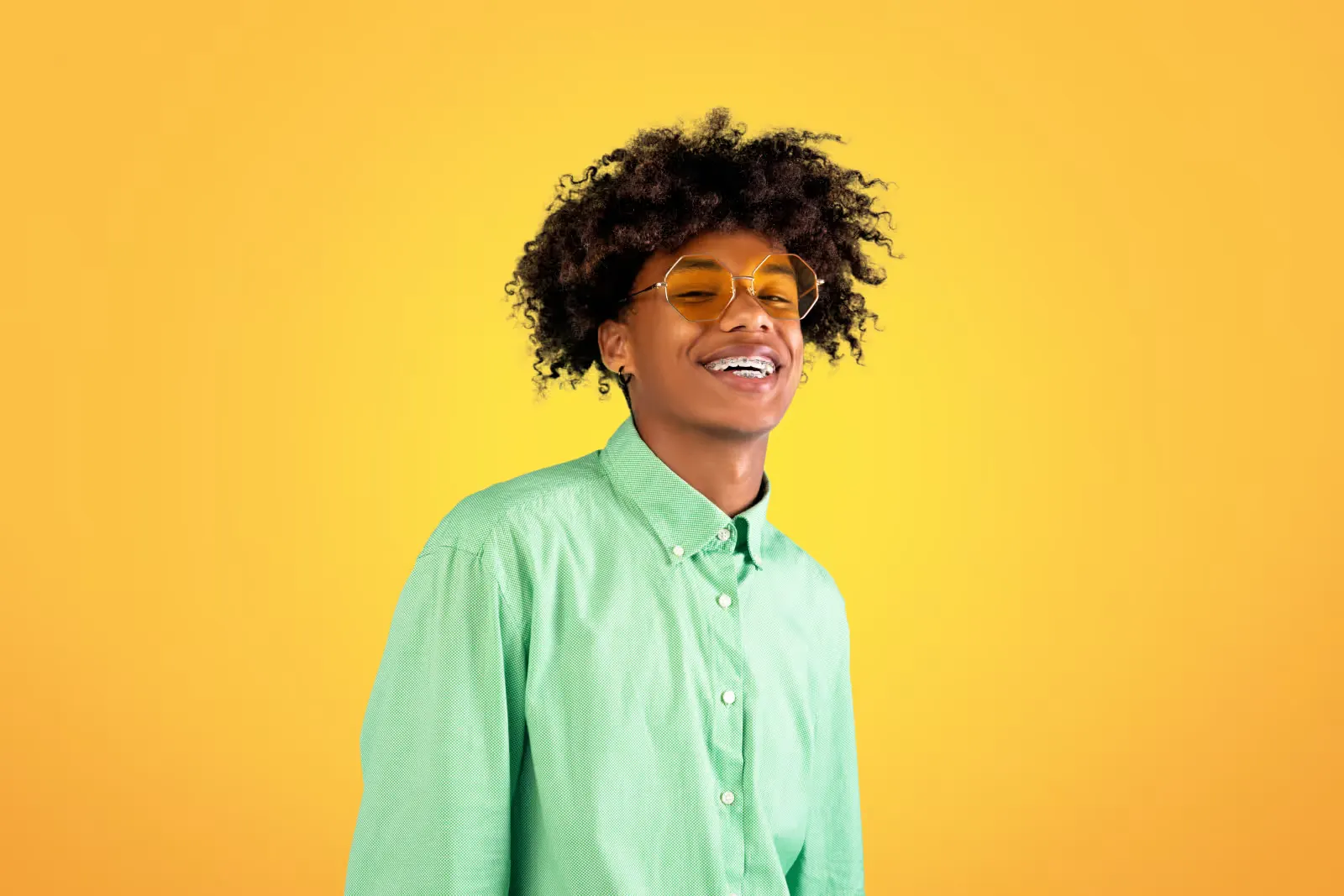 Smiling teen with braces
