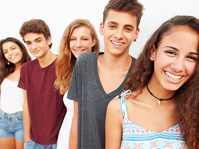 The image is a composite of several individual photos, each featuring different groups of young people smiling and posing for the camera.